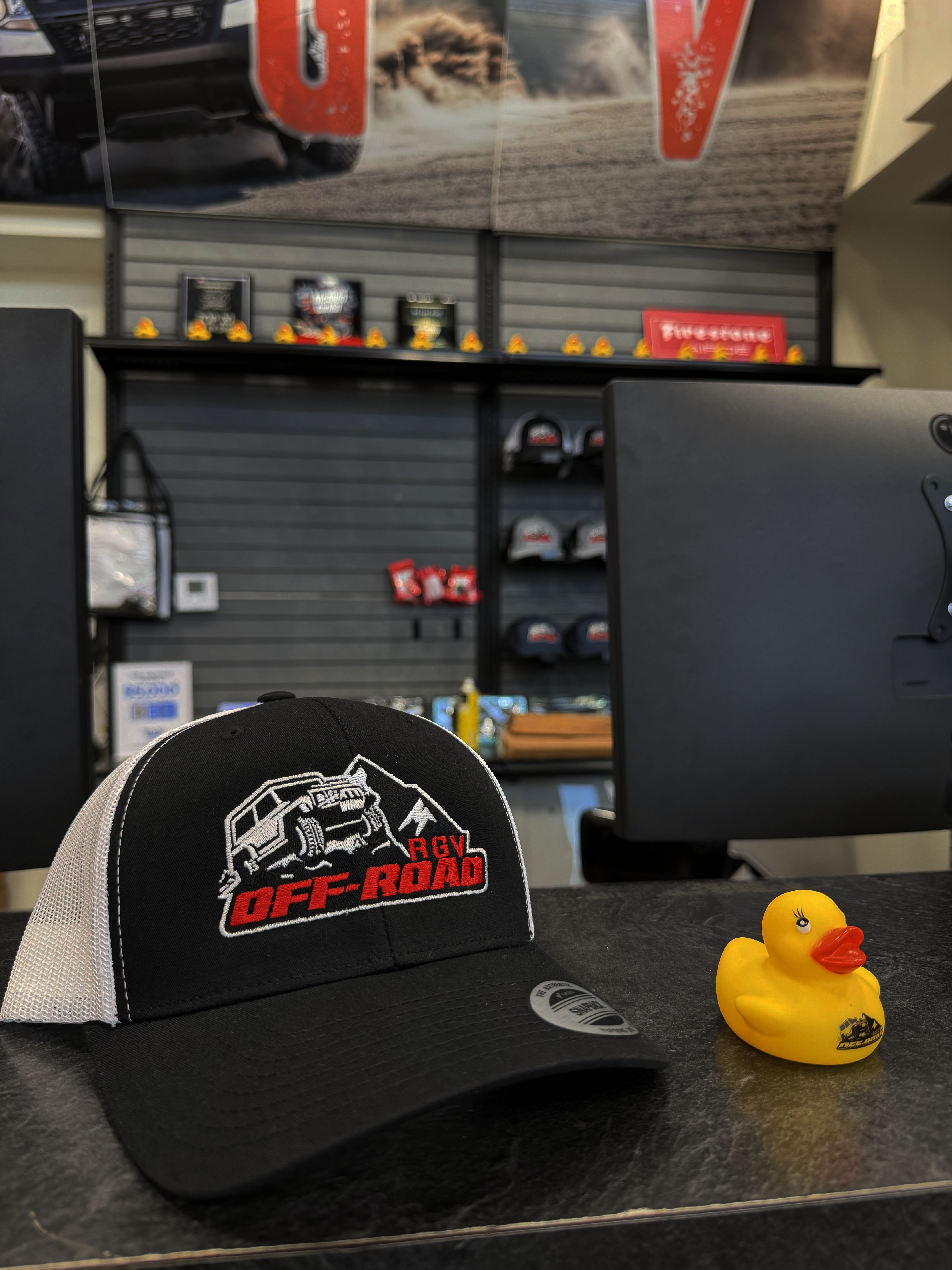 RGV Off-Road branded hats and Jeep ducks merchandise available in store at the McAllen showroom